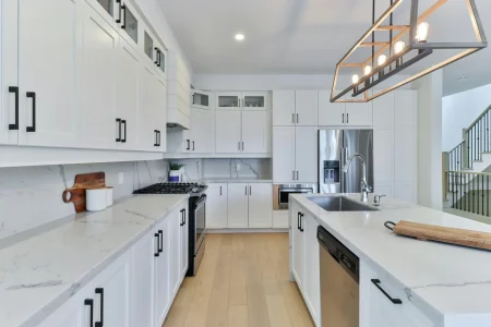 luxury-kitchen-dual-island-knoxville-tennessee.webp High-end kitchen remodel in Knoxville featuring dual islands and custom finishes