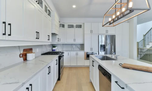 luxury-kitchen-dual-island-knoxville-tennessee.webp High-end kitchen remodel in Knoxville featuring dual islands and custom finishes